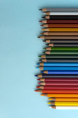 Color pencils on light blue background