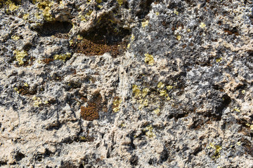 Masonry stone wall in the ancient city of side in Turkey. Natural stone background