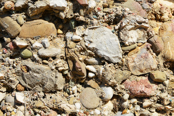 Masonry stone wall in the ancient city of side in Turkey. Natural stone background
