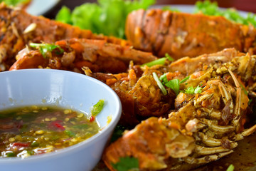 seafood Garlic fried crayfish and steamed rice are delicious and very popular food.