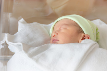 Selective focus of newborn baby boy sleeping