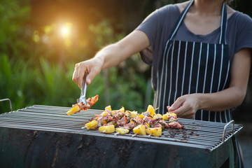 Barbeque Grill Street Food in thailand,Eat outdoors in a happy family. holiday celebration concept