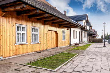 Fototapeta na wymiar LANCKORONA, POLAND - SEPTEMBER 17, 2016: Historic city centre of Lanckorona, polish resort. Wooden huts, inscribed on UNESCO world heritage list