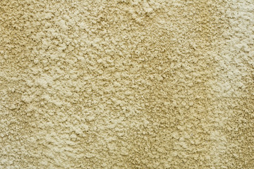 Texture of a concrete wall with cracks and scratches which can be used as a background