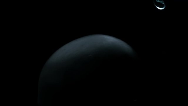 vfx plate shot of water spill drops on black sphere head and background v10