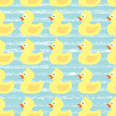 vector seamless pattern with cute rubber ducks