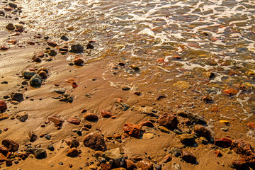 surf of the Balti sea on pebbles