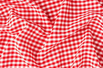 Red checkered tablecloth. Close up