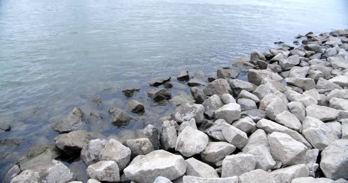 Rocky bank of the river rhine in cologne, germany