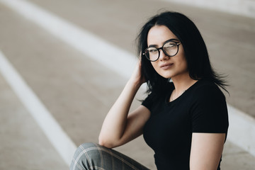 Portrait of Cute Brunette Girl in Black T-shirt