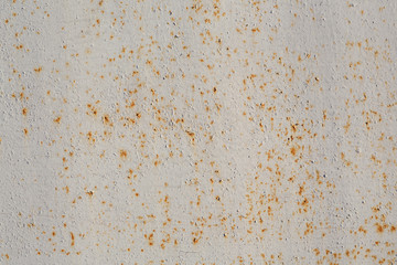 Old rusted metal texture. The surface of the light gray iron wall. Perfect for background and grunge design.