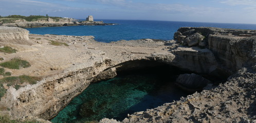 Poetry Cave is a natural karst complex in Salento. It consists in a elliptical shaped rocky room with turquoise water connected with the sea. It is a touristic attraction.