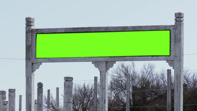 Old Wooden Road Sign with Green Screen.  You can replace green screen with the logo, text or picture you want. You can do it with &ldquo;Keying&rdquo; effect in After Effects  (check out tutorials on YouTube). 