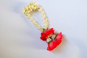 Flower garland on white background 