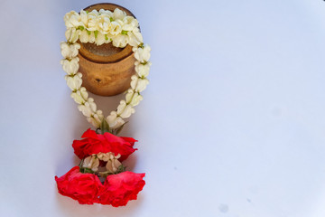 Flower garland on white background 