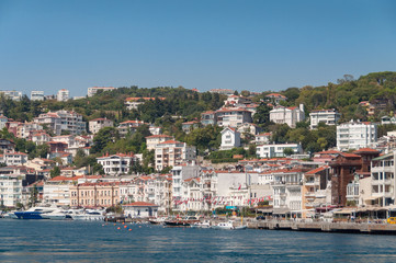 Fototapeta na wymiar Waterfront houses on a hill. Residential property in Istanbul