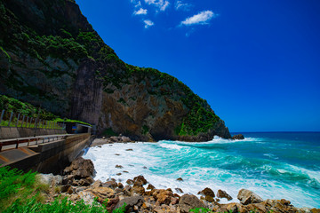 Tokuhama cliff near the blue ocean in Amami oshima Kagoshima wide shot