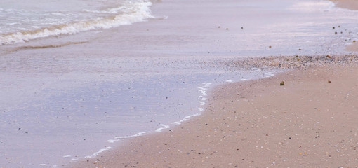 Wave and sand . Calm sea. Black Sea Coast