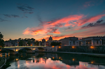 Rome cityscape at sunset with view of St Peters Basilica in Vatican