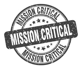 mission critical stamp. mission critical round grunge sign. mission critical