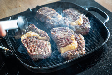 grilled steaks on the pan