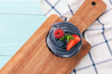 delicious cupcakes on a colored background. Festive background, birthday