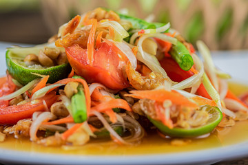 Close up Somtum. Thai spicy green papaya salad (Somtum thai)