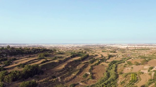 Aerial view of terraced agricultural fields near Buskette gardens. Drone dolly in shot