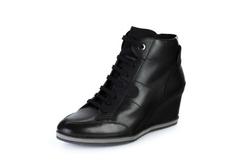 Winter female leather boots isolated on white background