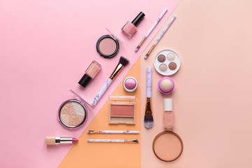 Naklejka premium Set of makeup cosmetics on color background
