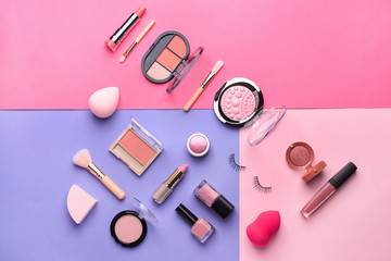 Obraz na płótnie Canvas Set of makeup cosmetics on color background