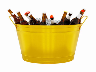 Cold beer bottles in ice of bucket
