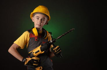 child the Builder costume posing with a work tool