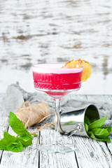 Alcoholic Raspberry Cocktail drink in a glass.