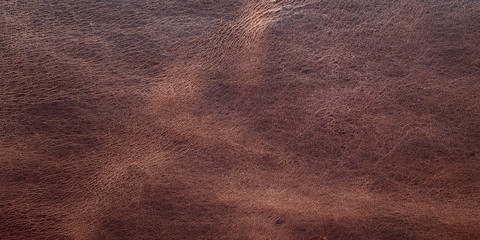Seamless brown leather texture, panorama background.