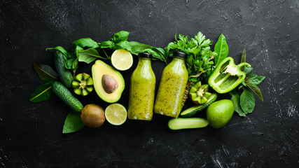 Green Smoothies of Vegetables and Fruits. Healthy food. Rustic style. Fruits. Top view. Free space for text.