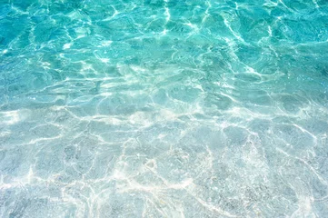 Selbstklebende Fototapeten Tropischer Strand beautiful tropical turquoise clear sea water surface  © OHishi_Foto