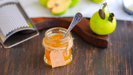 Ingredients for making homemade pear jam  on wooden table,.