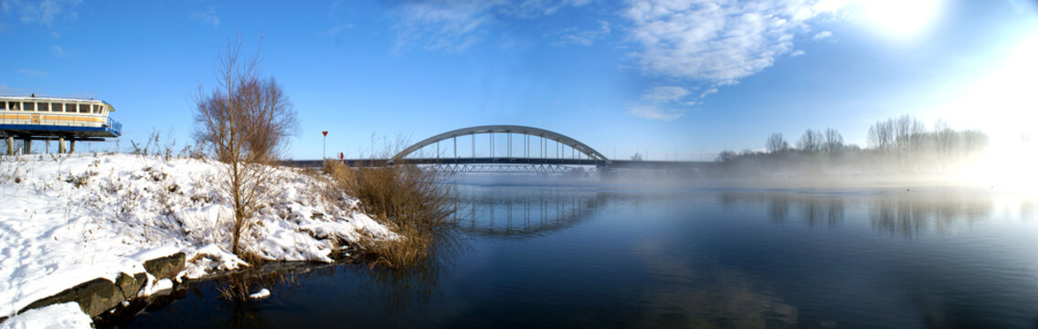 The bridge over the river Maas during winter in Hedel, near 's-Hertogenbosch, The Netherlands