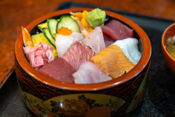 Chirashizushi is known as scattered sushi and is served on bowls with colorful toppings