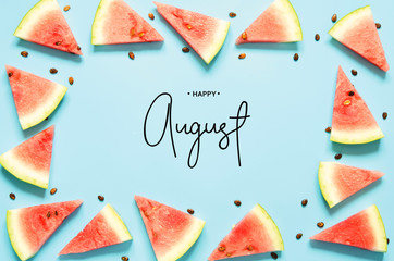 Inscription Happy August. Fresh red watermelon slice Isolated light blue background. Top view, Flat...