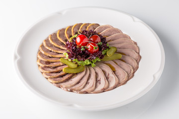 Slicing gourmet meat, pastrami, podcherevka, bastrum, beef and pork. Banquet festive dishes. Gourmet restaurant menu. White background.