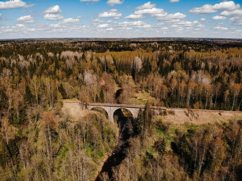 old stone bridge over the water river. Top view