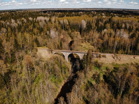 old stone bridge over the water river. Top view