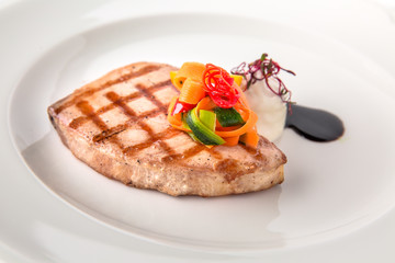 Grilled salmon fillet.  Banquet festive dishes. Gourmet restaurant menu. White background.