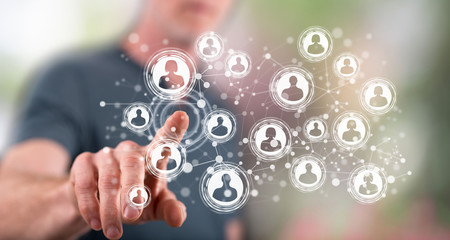 Fototapeta premium Man touching a social network concept