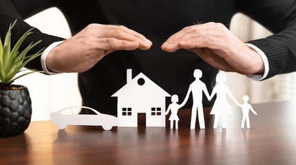 Concept of family, home and car insurance