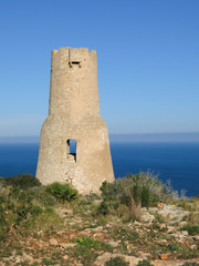 Torre Del Gerro, old tower in Denia. Mediteranean sea.