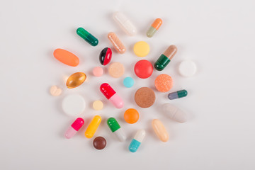 High number of pills on white background surface. High resolution image for pharmaceutical industry.  
