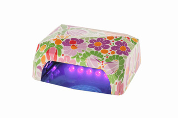 Ultraviolet led manicure floral working on dryer nail lamp. Isolated on white background